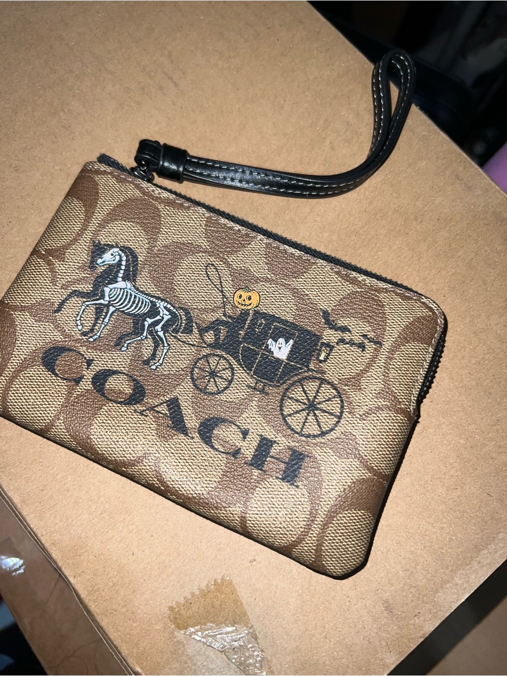 Coach Brown Signature Wristlet with Halloween Carriage Print